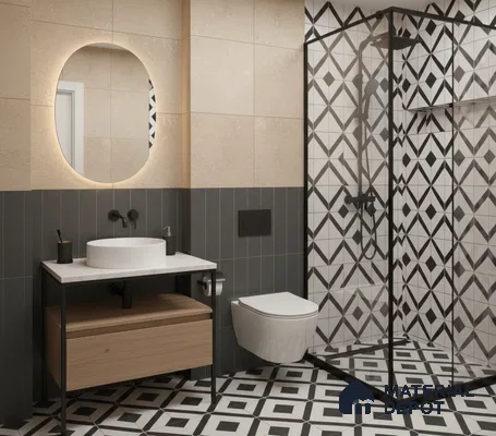 Modern bathroom with geometric black-and-white patterned tiles and beige wall tiles in Bengaluru | Material Depot