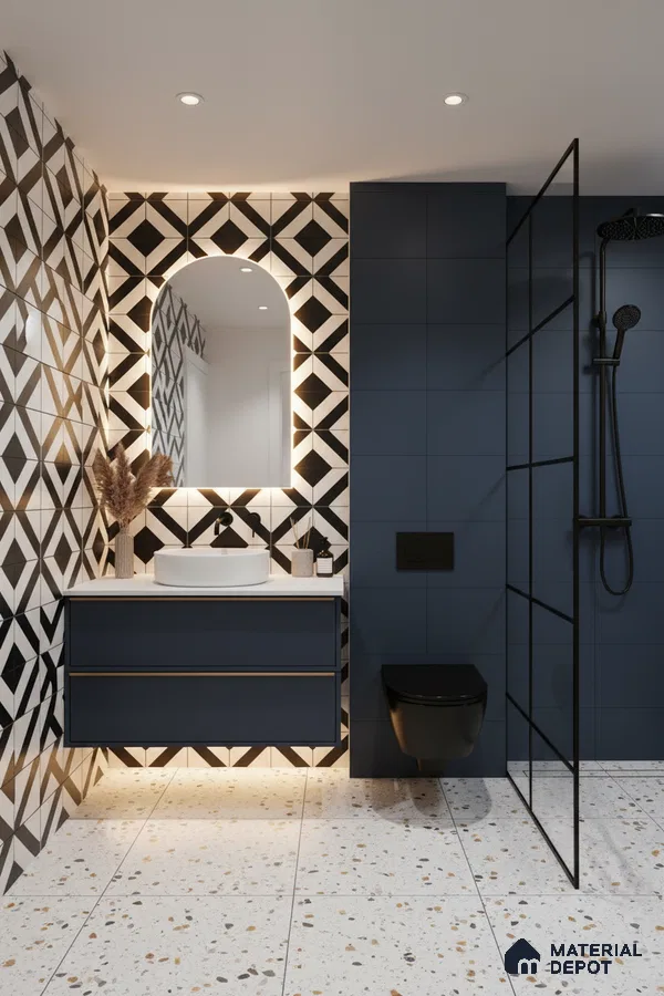 Modern bathroom with geometric black-and-white wall tiles, navy blue matte tiles, and terrazzo floor tiles in Bengaluru | Material Depot