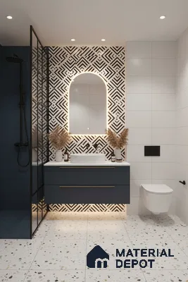 Modern bathroom with geometric black-and-white wall tiles, terrazzo floor tiles, and navy floating vanity in Bengaluru | Material Depot