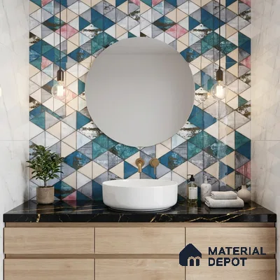 Modern bathroom with geometric blue and beige wall tiles, black marble countertop, and light wood vanity