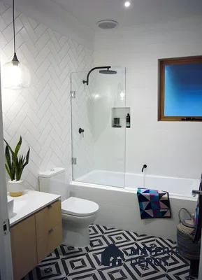 Modern Bathroom with Geometric Tiles and Wooden Vanity | Material Depot