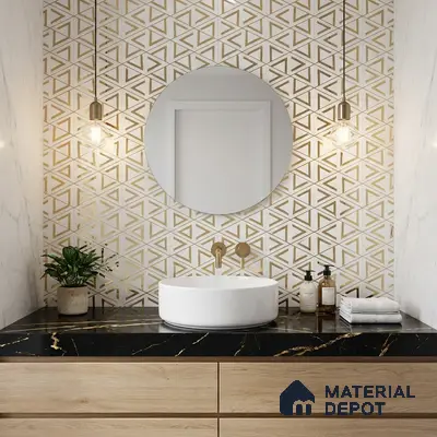 Modern bathroom with gold geometric wall tile, black marble countertop, and light oak wood vanity