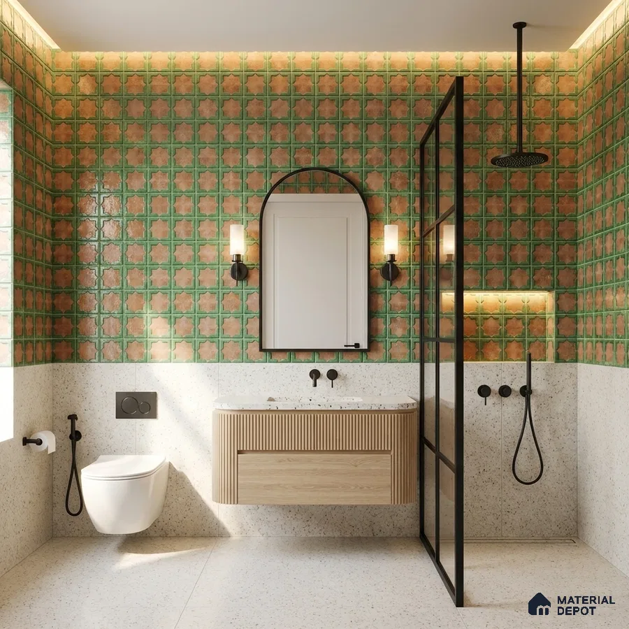Modern bathroom with green and terracotta moroccan wall tiles, terrazzo floor, and fluted wood vanity