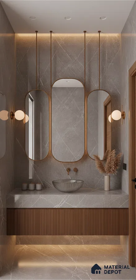 Modern bathroom with grey marble tiles, fluted wood vanity, and bronze accents | Material Depot