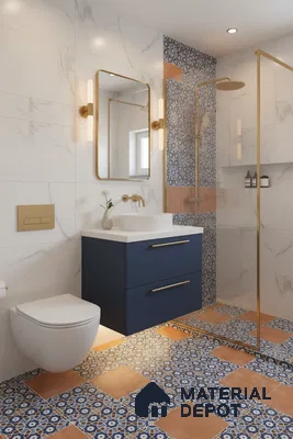 Modern bathroom with marble wall tiles, blue and terracotta patterned floor tiles, and gold accents in Bengaluru | Material Depot