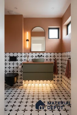 Modern bathroom with olive green vanity, terracotta wall paint, and black-and-white geometric patterned tiles in Bengaluru | Material Depot