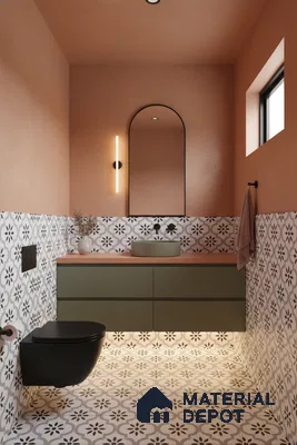 Modern bathroom with olive green vanity, terracotta wall paint, and black-and-white patterned floor and wall tiles in Bengaluru | Material Depot