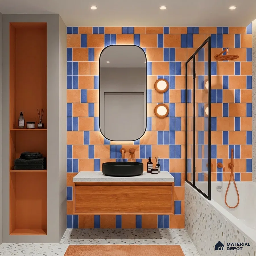 Modern bathroom with orange and blue geometric wall tiles, terrazzo floor, and wood vanity