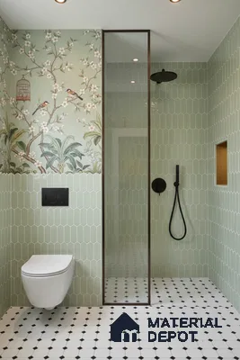 Modern bathroom with sage green elongated hexagonal wall tiles, chinoiserie floral wallpaper, and black-and-white geometric floor tiles | Material Depot
