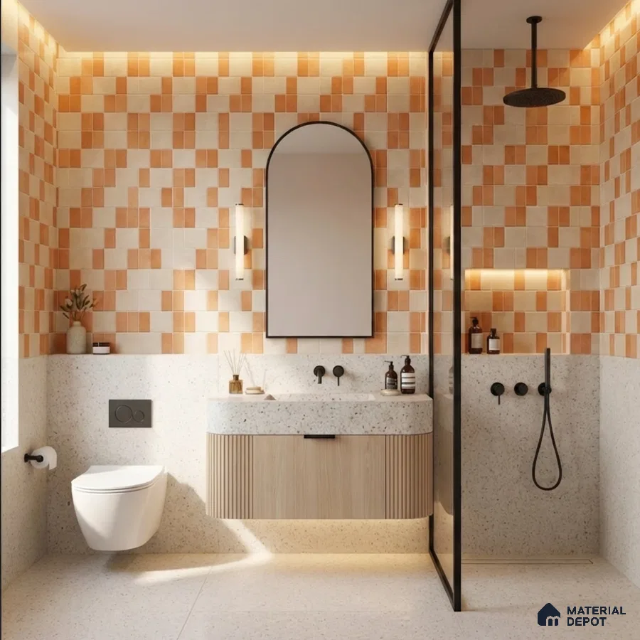 Modern bathroom with terracotta and cream patterned wall tiles, terrazzo floor, and fluted wood vanity