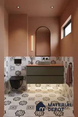 Modern bathroom with terracotta paint, olive green floating vanity, and black-and-white geometric patterned tiles in Bengaluru | Material Depot