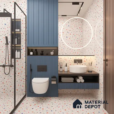 Modern Bathroom with Terrazzo Tiles, Fluted Blue Vanity & Storage Wall, Backlit Round Mirror and Black Framed Shower Partition in Prestige Royal Garden Doddaballapur | Material Depot