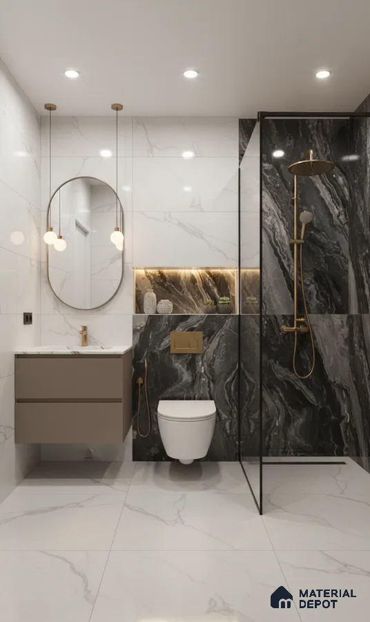Modern bathroom with white marble look wall and floor tiles, black marble look accent wall tiles, and gold fixtures | Material Depot