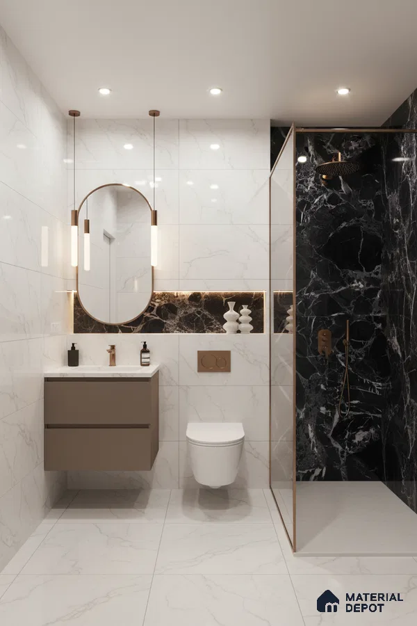 Modern bathroom with white marble-look wall and floor tiles, black marble highlighter wall, and floating taupe vanity | Material Depot