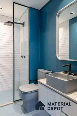 Modern bathroom with white subway wall tiles, matte blue paint, and grey sanitaryware in Purva-Riviera-Whitefield 3 BHK Bengaluru Apartment