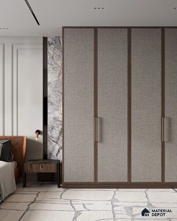 Modern bedroom with fabric textured wardrobe panels, walnut brown trims, and marble accent wall | Material Depot