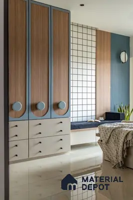 Modern bedroom with walnut wood laminate wardrobe, blue accent panels, and grid pattern wall tile | Material Depot