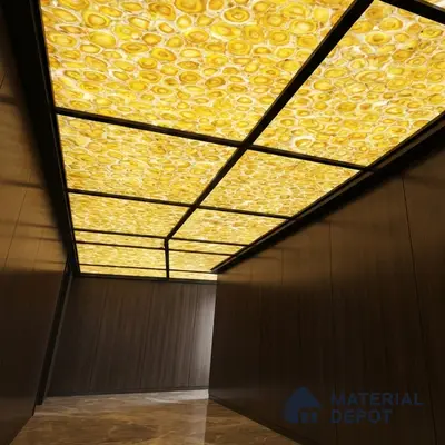 Modern ceiling with backlit yellow agate ceiling, walnut wood wall panels, and marble floor tile