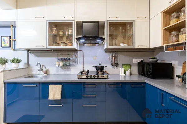 Modern dual tone kitchen with blue high gloss laminate, frosty white laminate, and grey quartz countertop in Bengaluru | Material Depot