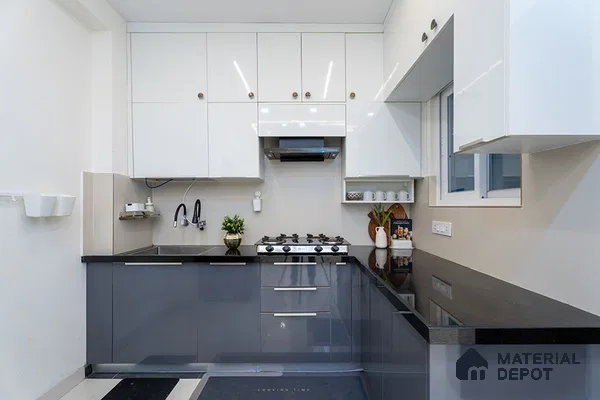 Modern dual tone kitchen with frosty white and grey high gloss laminate, black granite countertop in Bengaluru | Material Depot