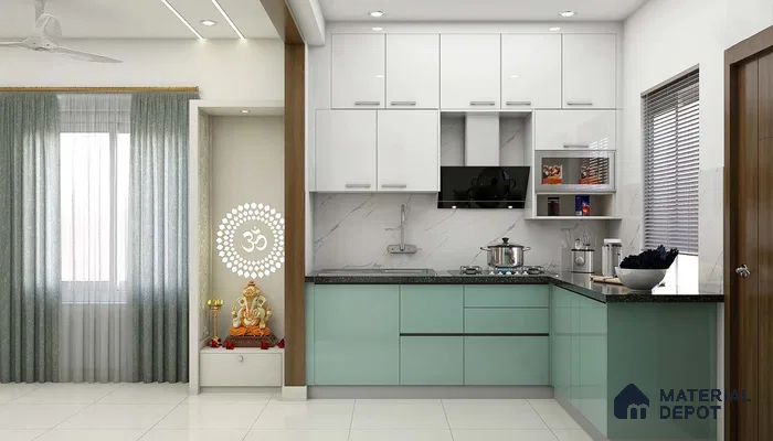 Modern dual tone kitchen with frosty white and pastel green laminate, marble backsplash, and black granite countertop in Bengaluru | Material Depot