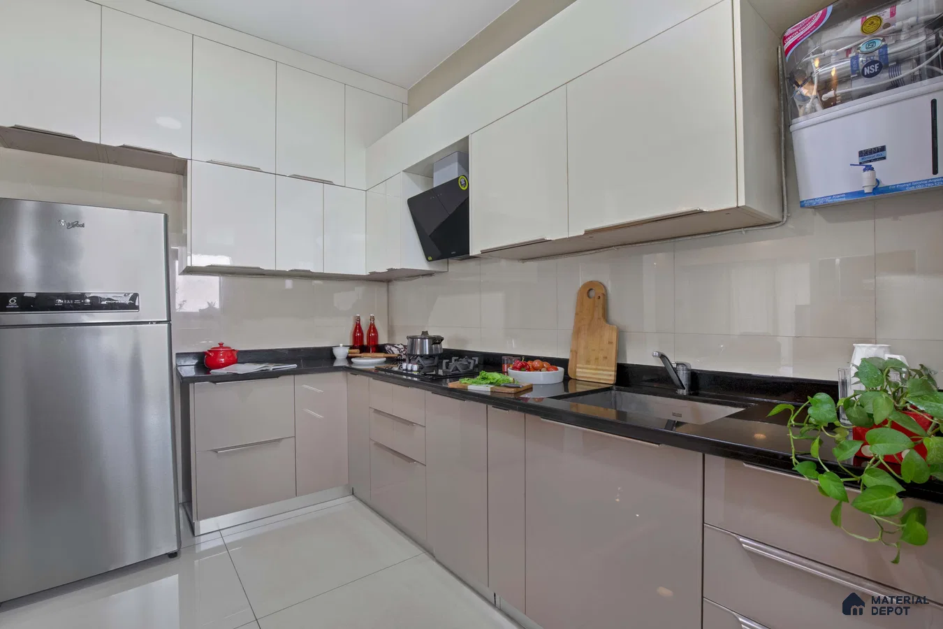 Modern dual tone kitchen with glossy beige and white laminate cabinets and black granite countertop in Bengaluru | Material Depot