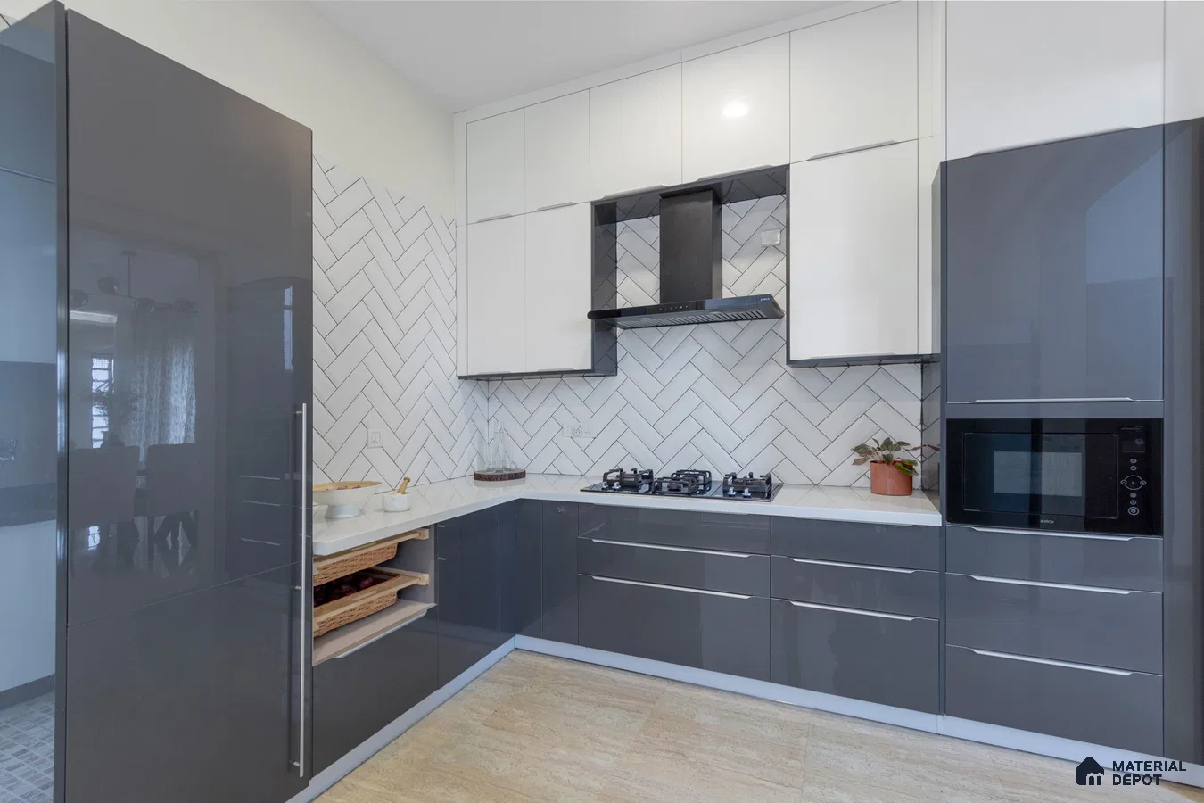 Modern dual tone kitchen with glossy grey and white laminate, white quartz countertop, and herringbone subway backsplash tile in Bengaluru | Material Depot