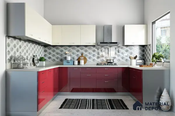 Modern dual tone kitchen with high gloss red and frosty white laminate, geometric backsplash tiles, and white quartz countertop in Bengaluru | Material Depot