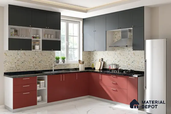Modern dual tone kitchen with matte grey and terracotta red laminate, terrazzo backsplash tile, and black quartz countertop in Bengaluru | Material Depot
