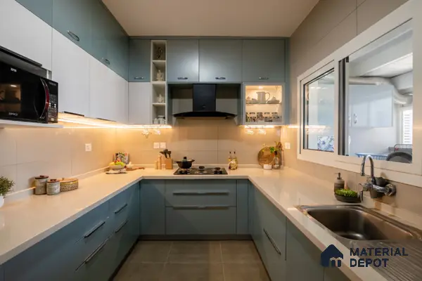 Modern dual tone kitchen with pastel blue and frosty white laminate, quartz countertop, and beige wall tiles in Bengaluru | Material Depot