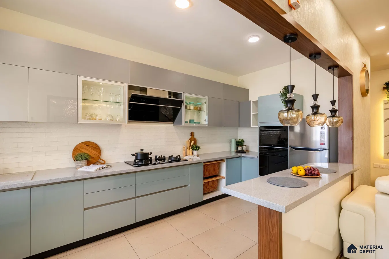 Modern dual tone kitchen with pastel blue and grey laminate, white quartz countertop, and white brick subway tile backsplash in Bengaluru | Material Depot