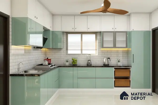 Modern dual tone kitchen with pastel green and frosty white high gloss laminate, black granite countertop, and white subway tile backsplash in Bengaluru | Material Depot