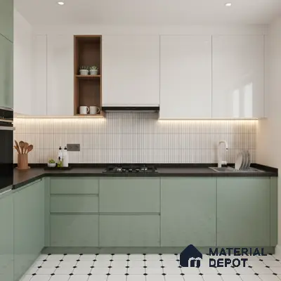 Modern dual tone kitchen with sage green and frosty white laminate, black quartz countertop, and white geometric floor tiles in Bengaluru