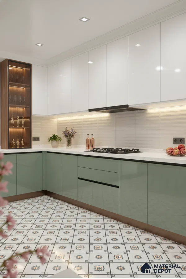 Modern dual tone kitchen with sage green and white high gloss laminate, white quartz countertop, and patterned floor tiles in Bengaluru