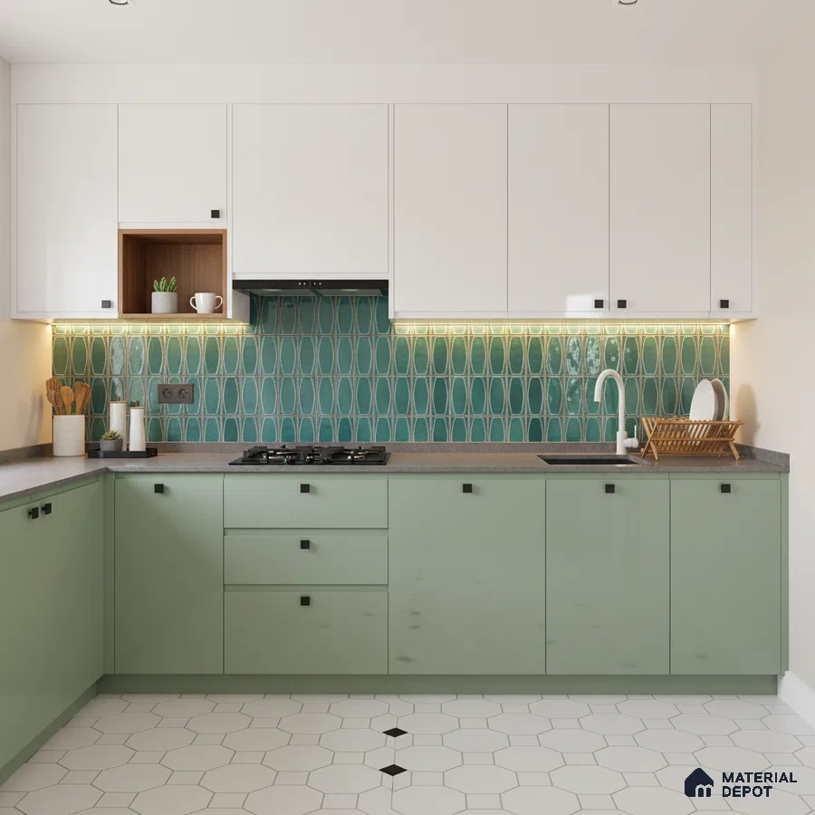 Modern dual tone kitchen with sage green and white laminate, teal geometric backsplash tile, and white hexagonal floor tile in Bengaluru