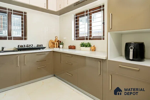 Modern dual tone kitchen with taupe and frosty white laminate cabinets and white quartz countertop in Bengaluru | Material Depot