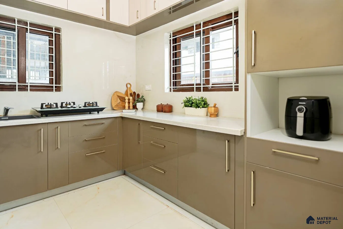 Modern dual tone kitchen with taupe and frosty white laminate cabinets and white quartz countertop in Bengaluru | Material Depot