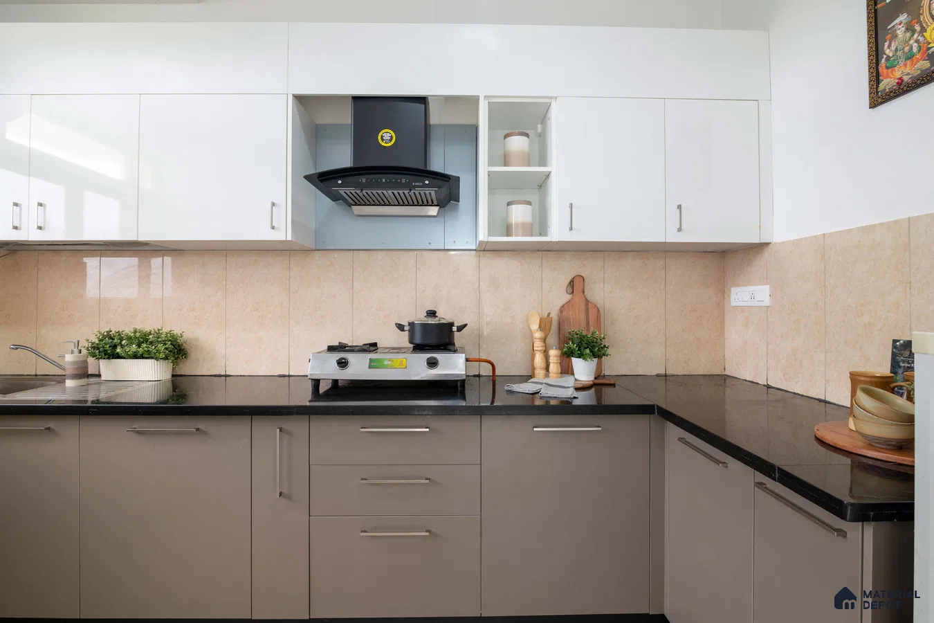 Modern dual tone kitchen with white and taupe laminate cabinets, black granite countertop, and beige wall tiles in Bengaluru | Material Depot