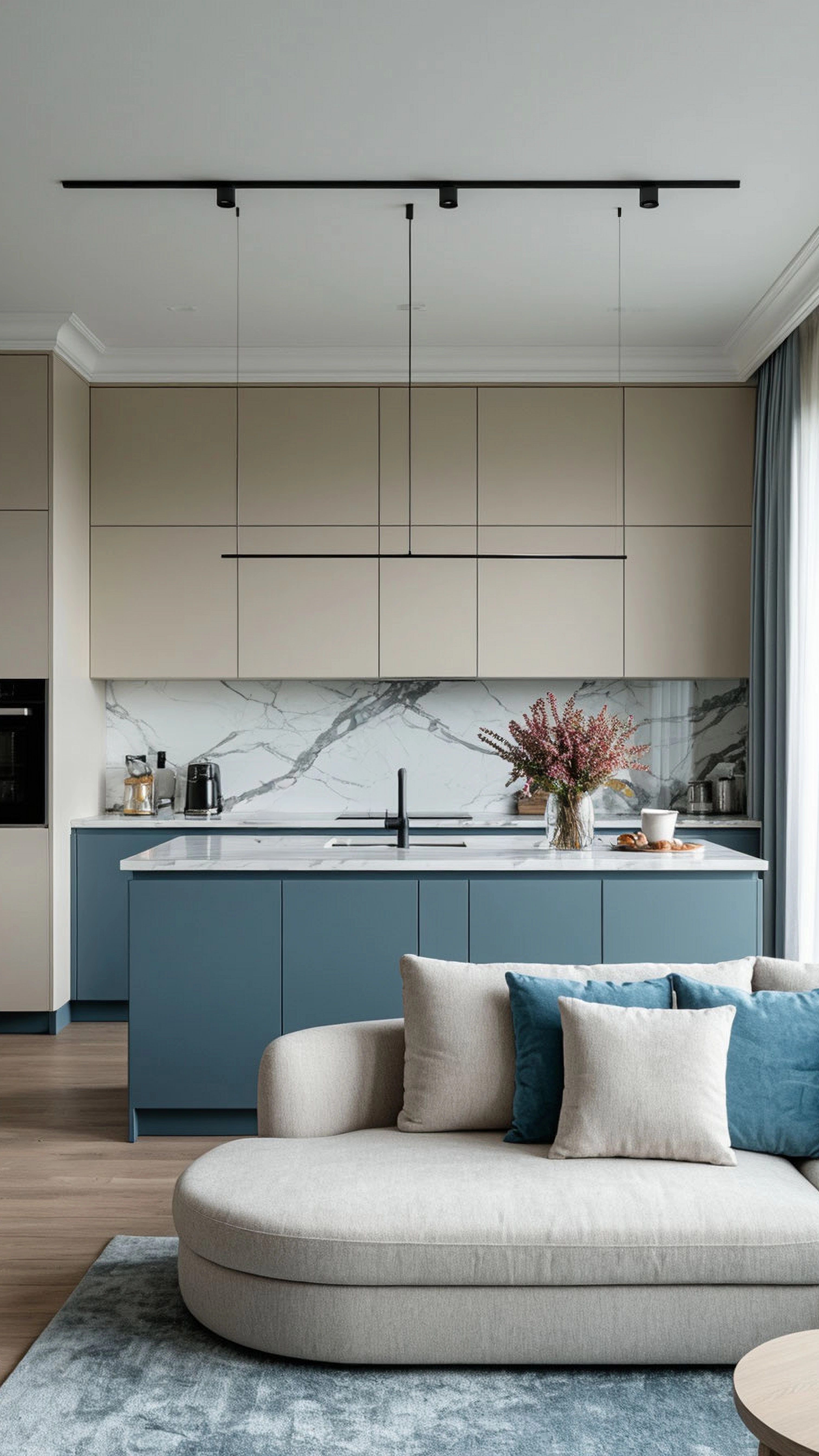 Modern kitchen with beige and blue laminate cabinets, white marble backsplash, and quartz countertop in Bengaluru | Material Depot