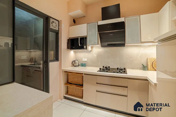 Modern kitchen with beige high gloss laminate, white marble-look backsplash, and quartz countertop in Bengaluru | Material Depot