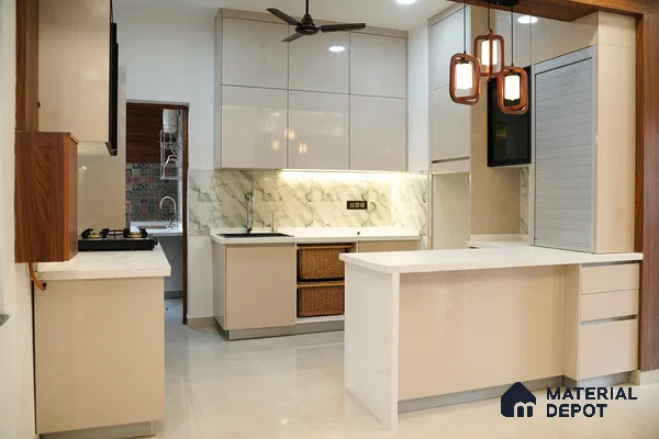 Modern kitchen with beige high gloss laminate, white marble-look backsplash tile, and white quartz countertop in Bengaluru | Material Depot