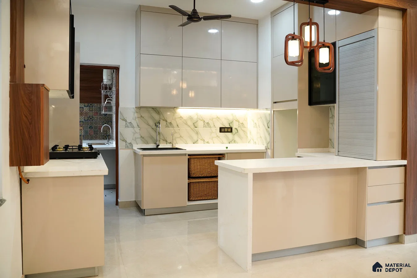 Modern kitchen with beige high gloss laminate, white marble-look backsplash tile, and white quartz countertop in Bengaluru | Material Depot