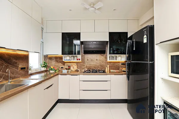 Modern kitchen with beige laminate cabinets, brown marble backsplash, and brown quartz countertop in Bengaluru | Material Depot
