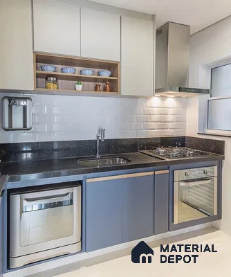 Modern kitchen with blue and beige laminate cabinets, black granite countertop, and white subway backsplash tiles in Bengaluru | Material Depot