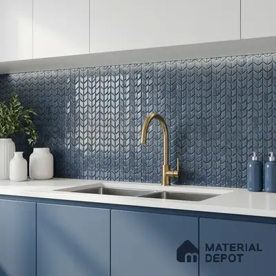 Modern kitchen with blue geometric backsplash tile, matte blue laminate cabinets, and white quartz countertop