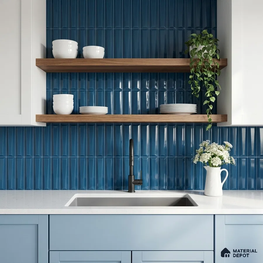 Modern kitchen with blue kitkat backsplash tile, white quartz countertop, and pastel blue laminate cabinets