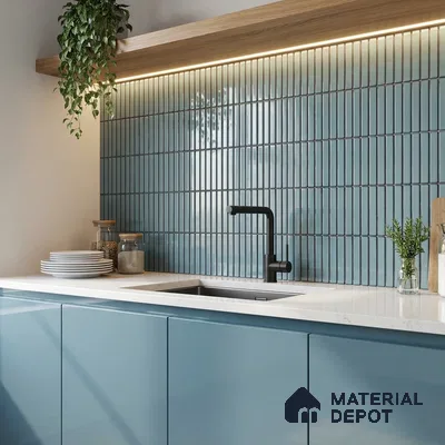Modern kitchen with blue kitkat subway backsplash tile, glossy blue laminate cabinets, and white quartz countertop