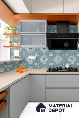Modern kitchen with blue patterned tile backsplash, light grey matte laminate cabinets, and beige quartz countertop in Purva Midtown B-Narayanapura 3 BHK Bengaluru Apartment