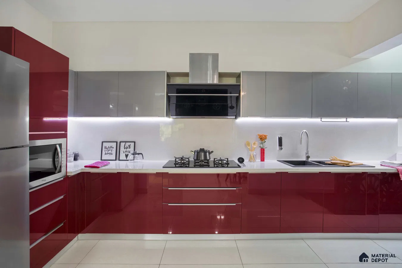 Modern kitchen with burgundy high gloss laminate, grey high gloss laminate, and white quartz countertop in Bengaluru | Material Depot