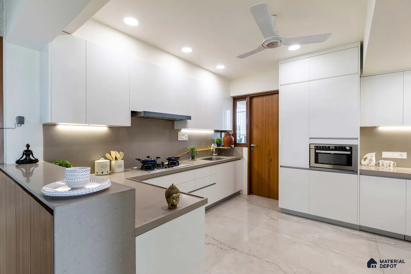 Modern kitchen with frosty white laminate cabinets, taupe quartz countertop, and marble-look floor tiles in Bengaluru | Material Depot